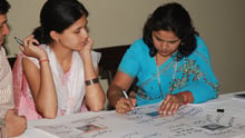 Two teachers participate in a Teacher Training workshop in Delhi, India.